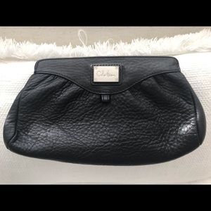 Cole Haan magnetic leather clutch bag